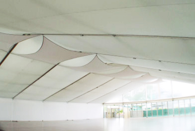 Marquee with insulated solid glazed panels